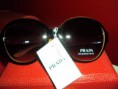 /album/galeria-de-fotos-produto-11/prada-oculos-castanho-jpg/